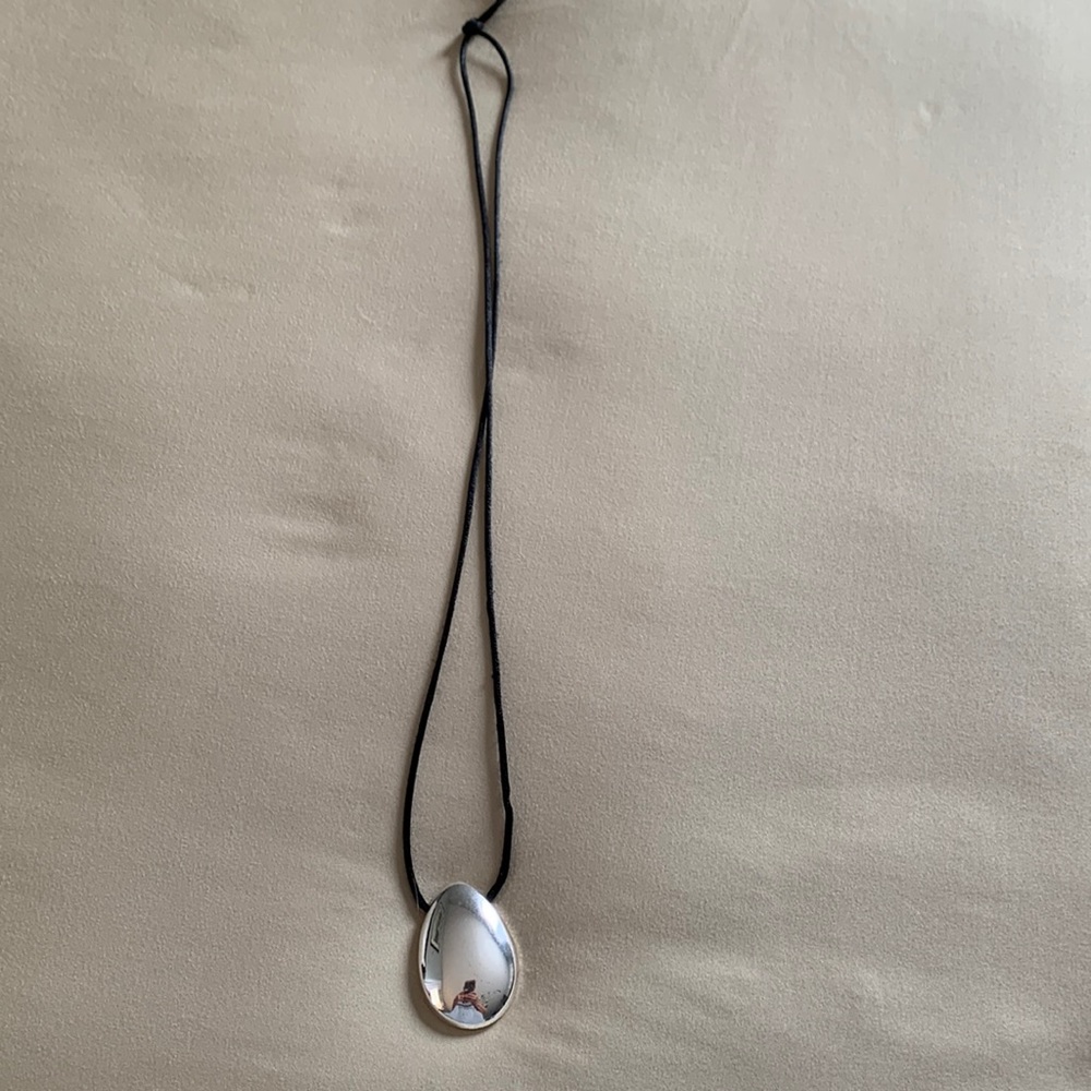 JJill pendant. Silver. Black nylon cord